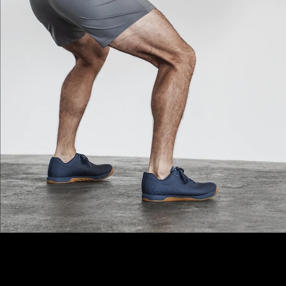 NOBULL Navy Trainers with Gum bottom/ mens size 9.